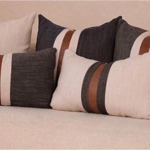 SOLD……cute decorative pillows!  2 12x20 (dark grey) and 2 16x16 (light grey)